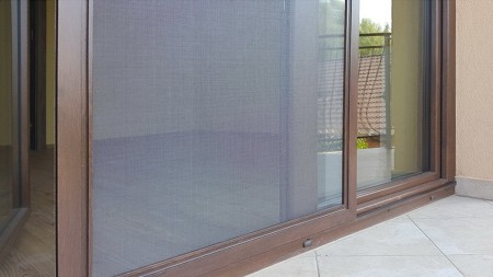 Moskitiera przesuwna na okno balkonowe