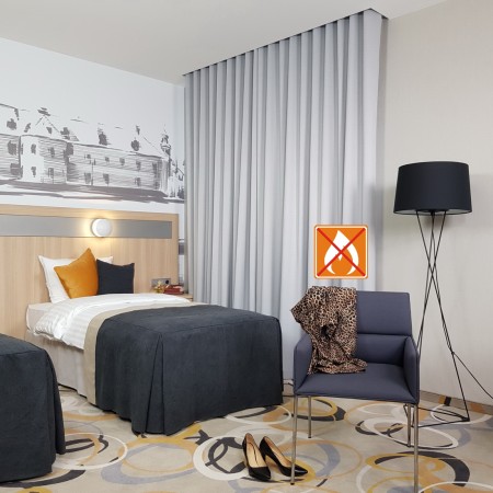 Zasłony niepalne z atestem.